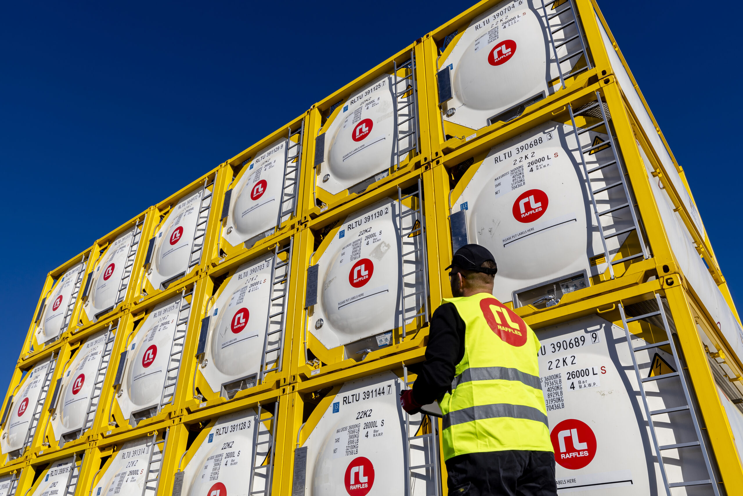 Fleet tank container iso with man on tablet - raffles lease